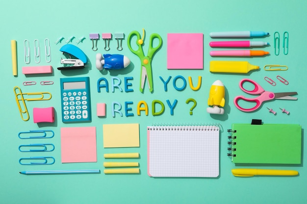 Notebook and stationery on the table top view