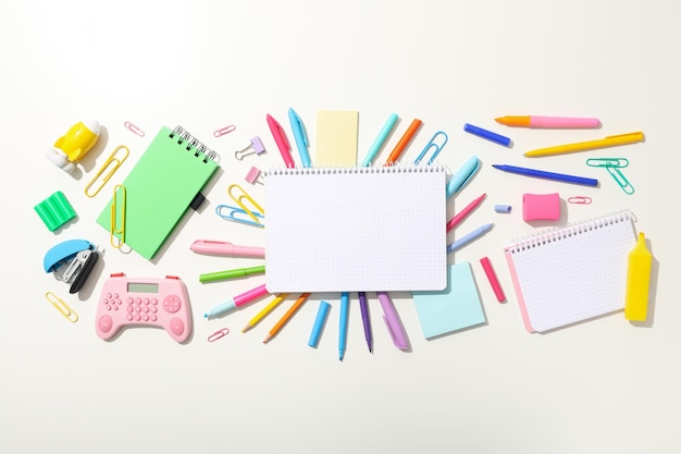 Photo notebook and stationery on the table top view