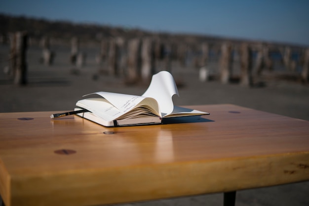 Notebook on the table in nature