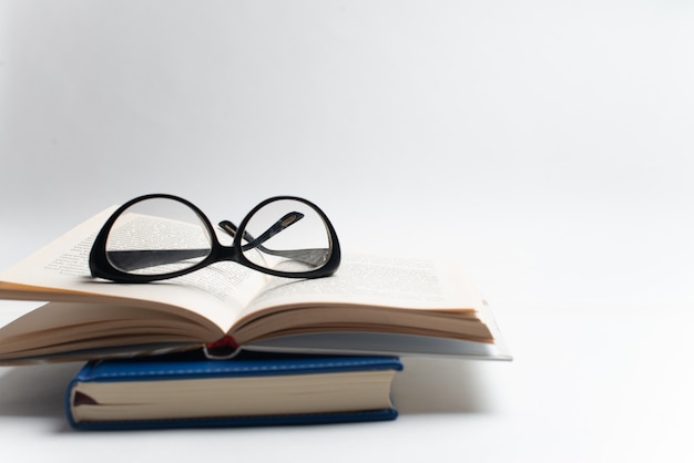 Notebook with glasses and pen, Book with glasses, Blue notebook with glasses, Book with cup of tea