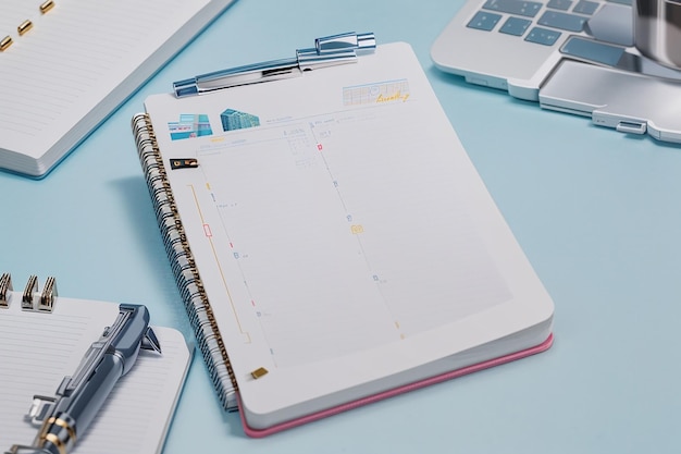 Notebook with to do list on desk