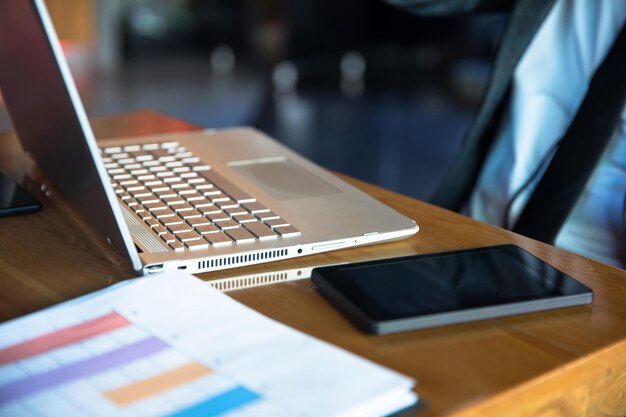 Notebook with tablet on working table