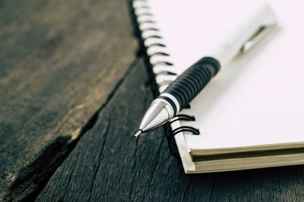 notebooks and pencil on the desk