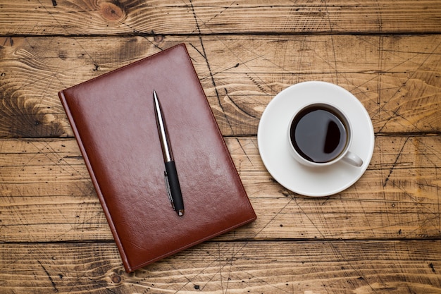 Notepad and Cup of coffee