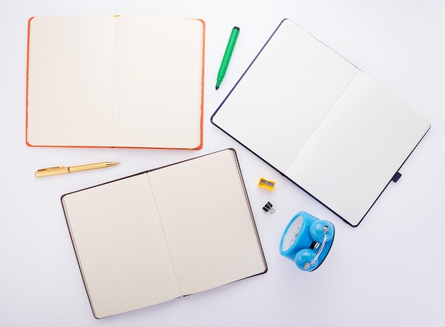 Notepad or notebook paper at white background, top view