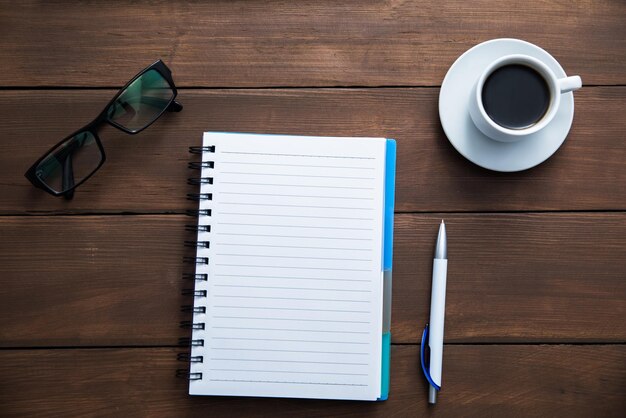 Notepad with coffee