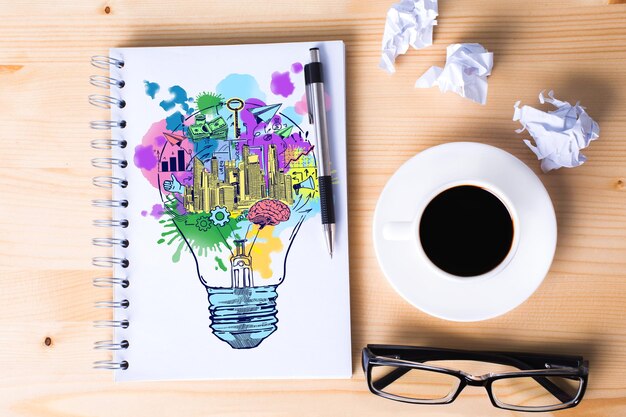 Notepad with creative lamp sketch
