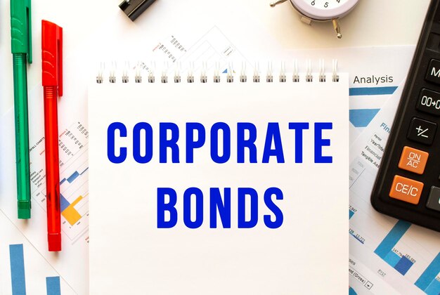 Notepad with the text CORPORATE BONDS on a color financial chart Business concept