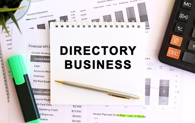 Notepad with text DIRECTORY BUSINESS. Business concept.