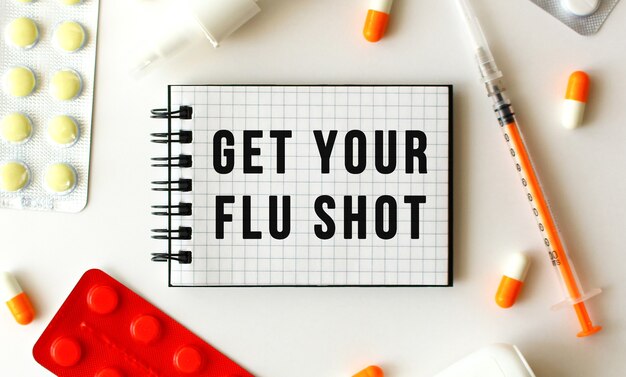 Photo notepad with text get your flu shot