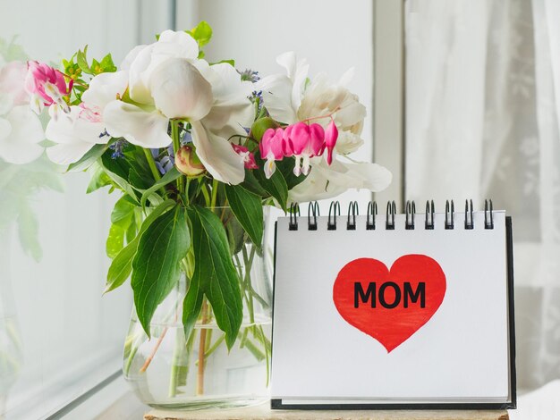 Notepad with the word MOM Greeting card