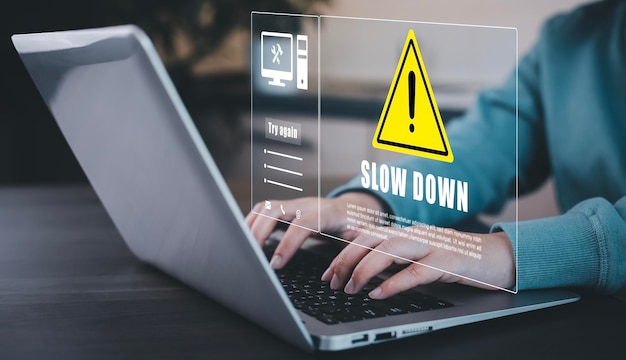 notification error and maintenance with triangle caution warning sign for notification error Programmer using laptop with triangle caution warning sign hacker attacks cyber crime cyber security