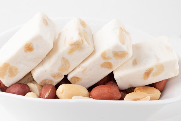 Nougat with peanuts close up.