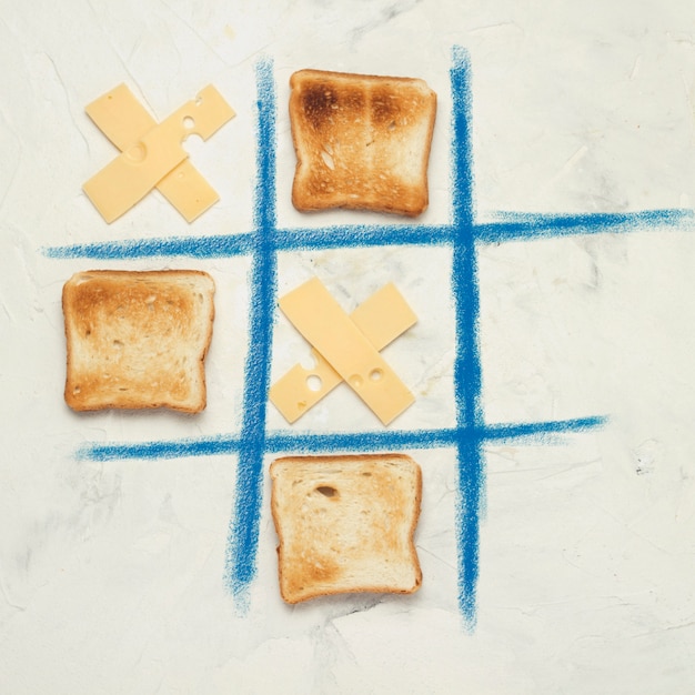 Noughts and Crosses, Choice, Game Competition of Crosses from Cheese and Square Toasted Toast White Stone