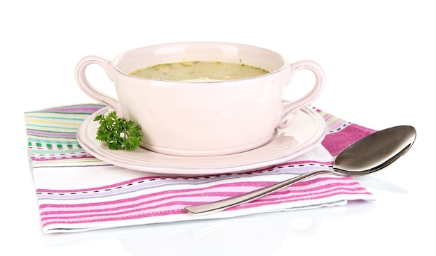 Nourishing soup with vegetables in pan isolated on white