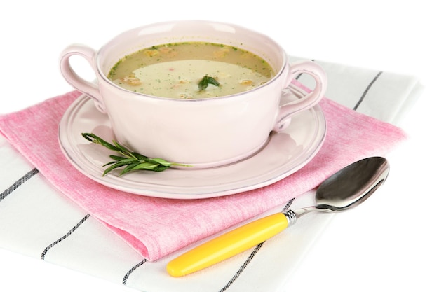 Nourishing soup with vegetables in pan isolated on white