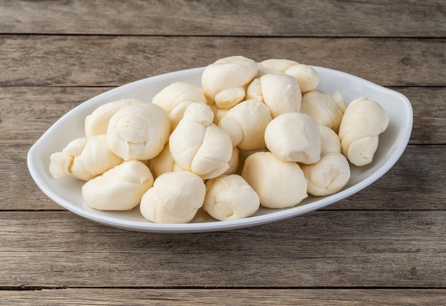 Nozinho or Knot mozzarella, typical brazilian artisanal fresh white cheese.