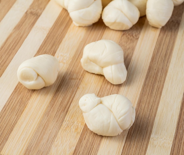 Nozinho or Knot mozzarella, typical brazilian artisanal fresh white cheese.