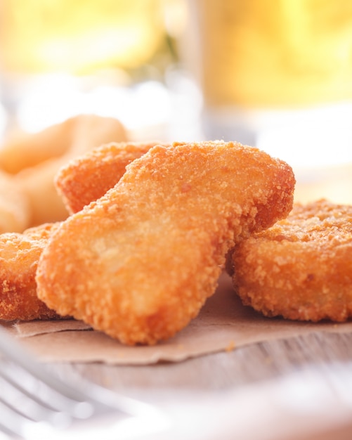 Nuggets on Wood Background