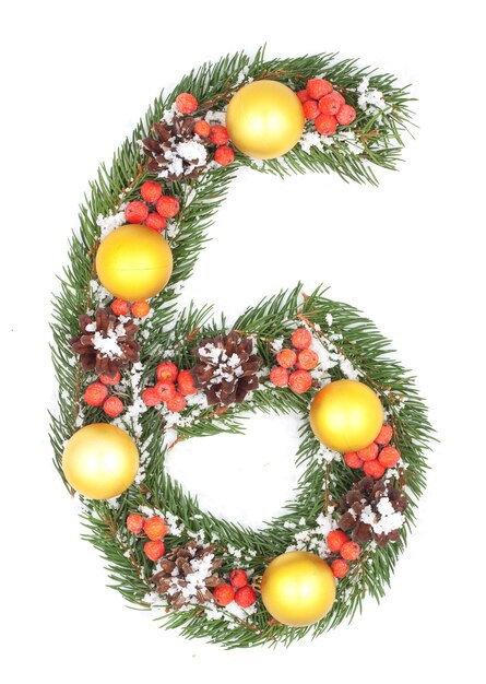 number 6 made of Christmas fir branch and decorations