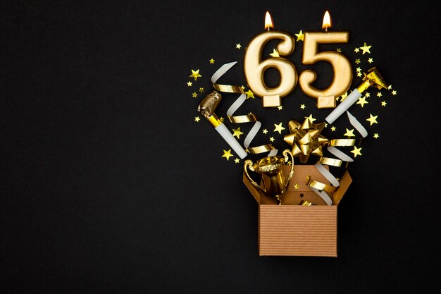 Photo number 65 gold celebration candle and gift box background