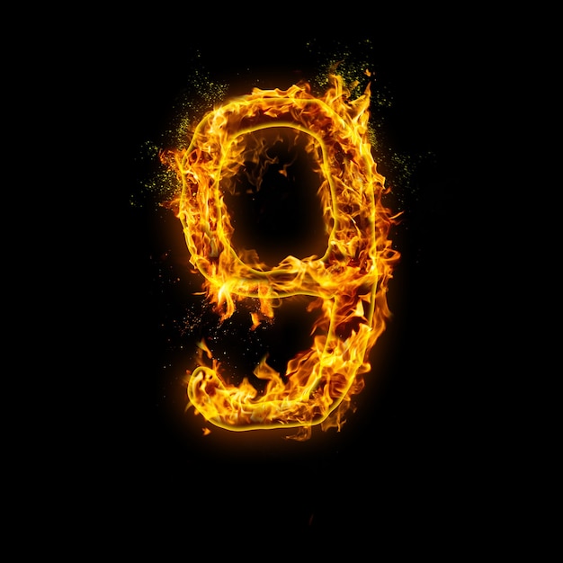 Number 9. Fire flames on black , realistic fire effect with sparks.