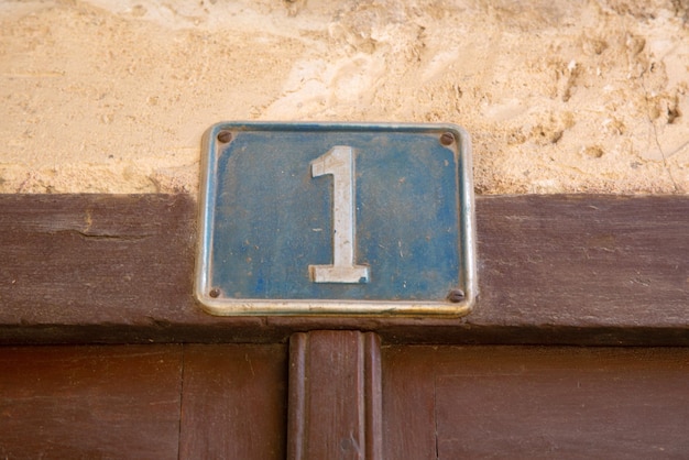 Number One Sign on Front Door