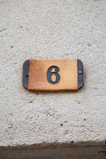 Number Six on Wall