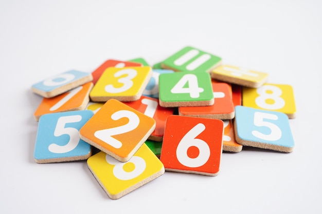 Number wood block cubes for learning Mathematic, education math concept.