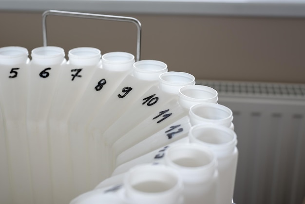 Numbered containers of an automatic sampling machine for sampling wastewater and surface water for chemical analysis