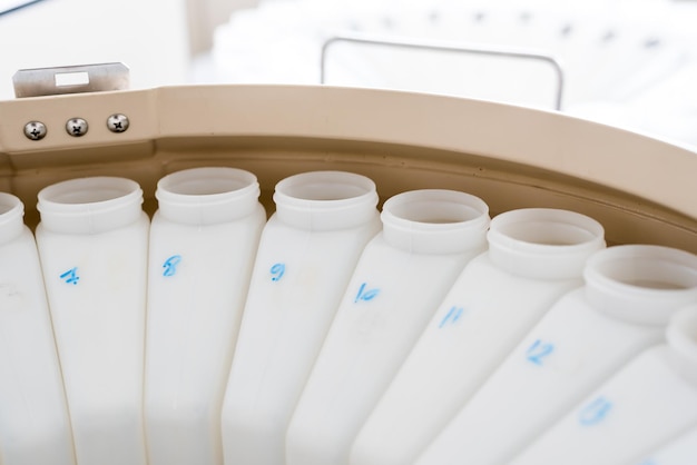 Numbered containers of an automatic sampling machine for sampling wastewater and surface water for chemical analysis