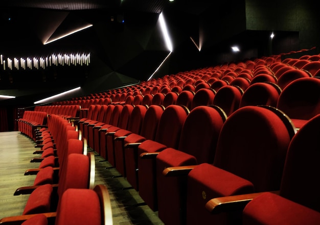 Numbered theater chairs with red velvet