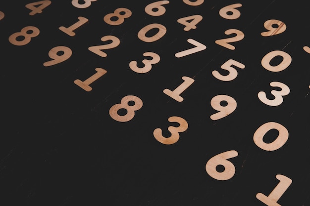 Numbers on a black background with numbers on them