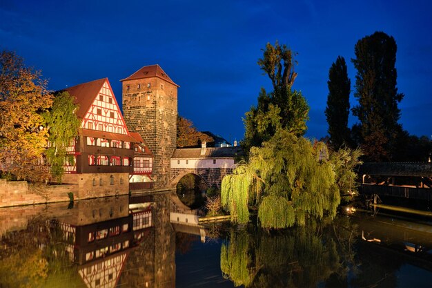 Photo nuremberg city houses on riverside of pegnitz river nuremberg franconia bavaria germany