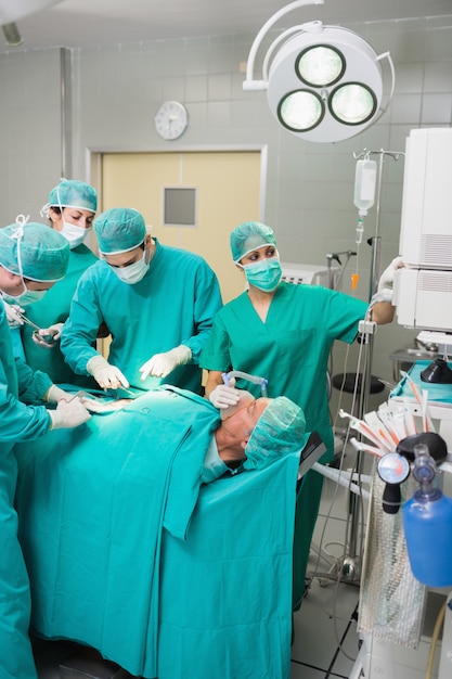 Nurse adjusting a monitor