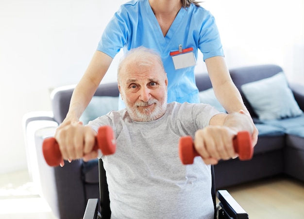 Nurse doctor senior care exercise physical therapy ecercising help assistance retirement home