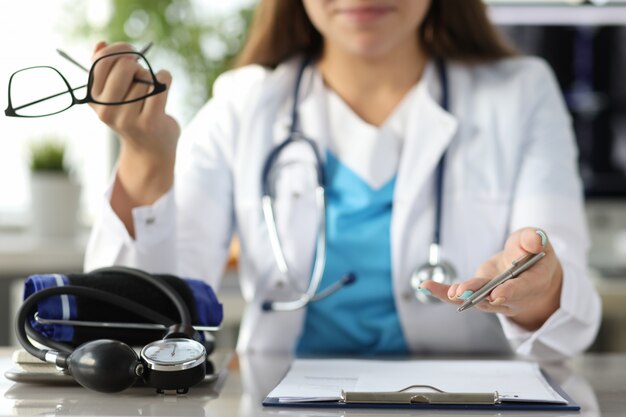 Nurse filling in patient form