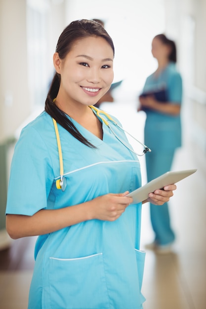 Nurse holding digital tablet