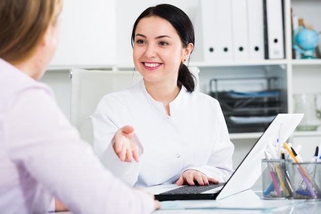 Nurse making appointment for client