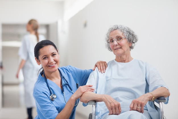 Nurse and patient smiling