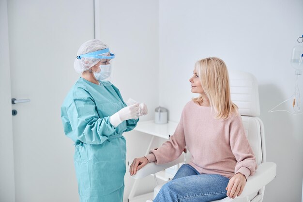 Nurse preparing for performing a pcr test