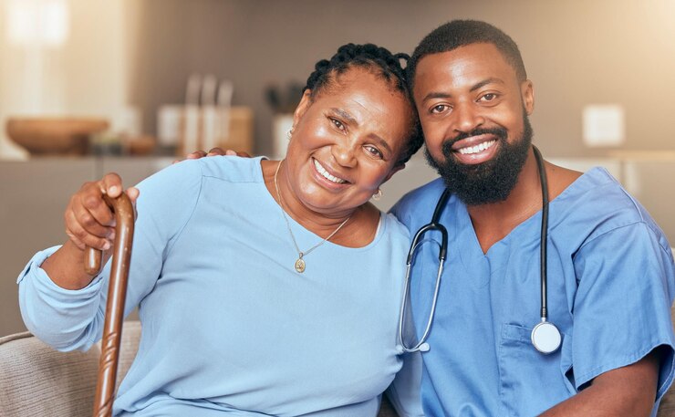 Photo nurse senior black woman and doctor or caregiver hugging for support love and gratitude in nursing home smile healthcare worker and happy african elderly person with a cane for a disability