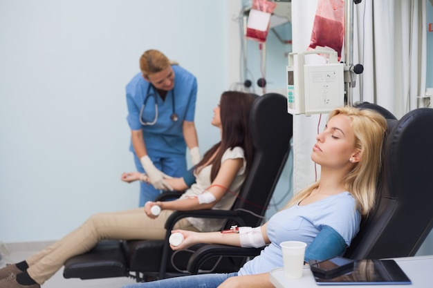 Nurse taking care of a blood donor