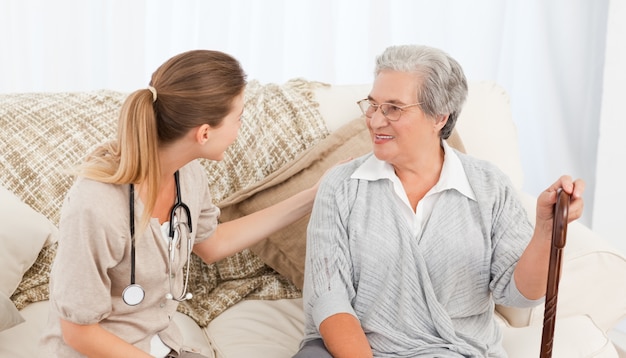 Nurse talking with her patient