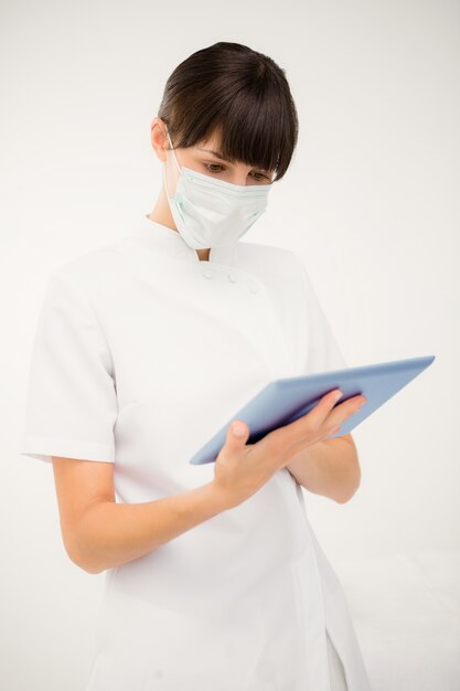 Nurse using a digital tablet 