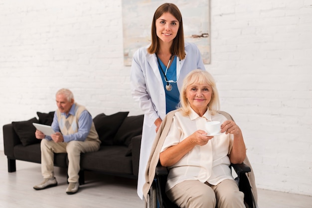 nurse and woman looking at the camera