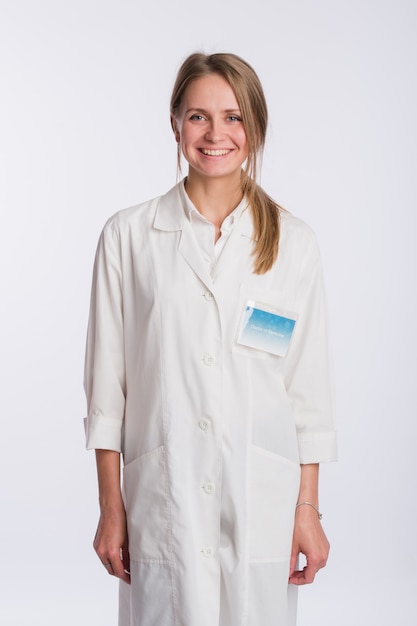 Nurse or young doctor standing isolated