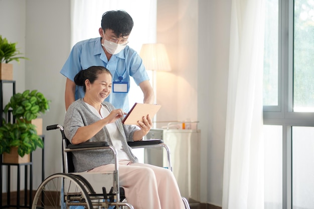 Nursing Home Worker Helping Patient