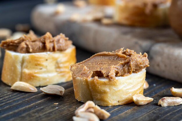 Nut food on a cutting wooden board in the kitchen