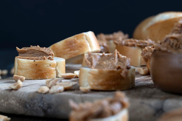 Nut food on a cutting wooden board in the kitchen